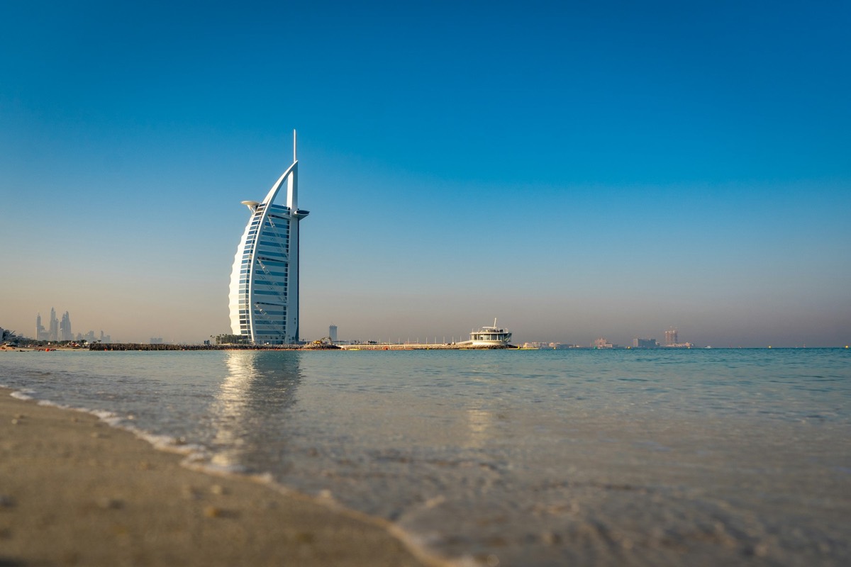 Dubai skyline glowing at dusk